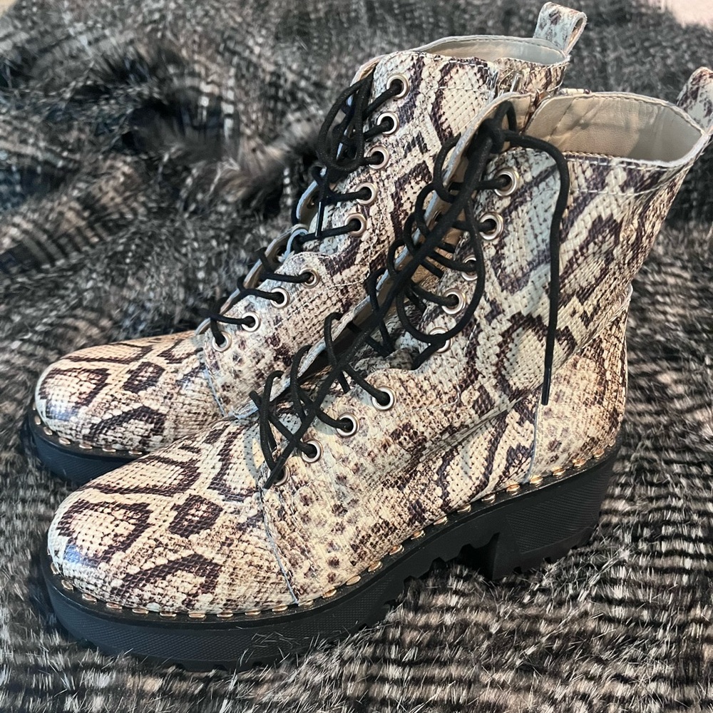 Vince Camuto snake print combat boots